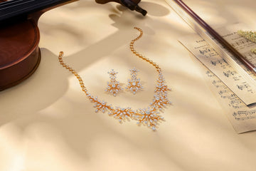 Diamond necklace and earrings with musical notes