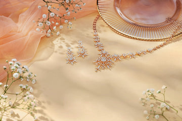 Sparkling diamond necklace and earrings with delicate flowers