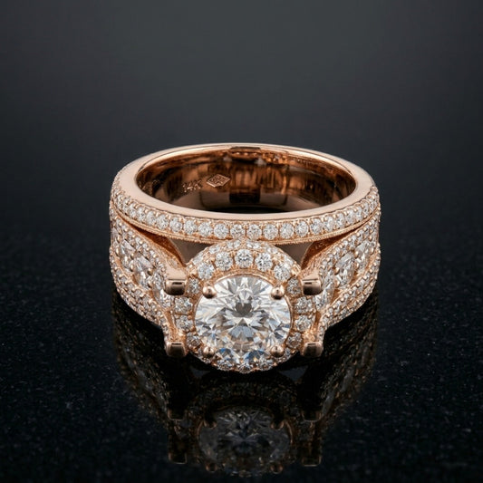 Rose gold ring with diamond accents on a black background